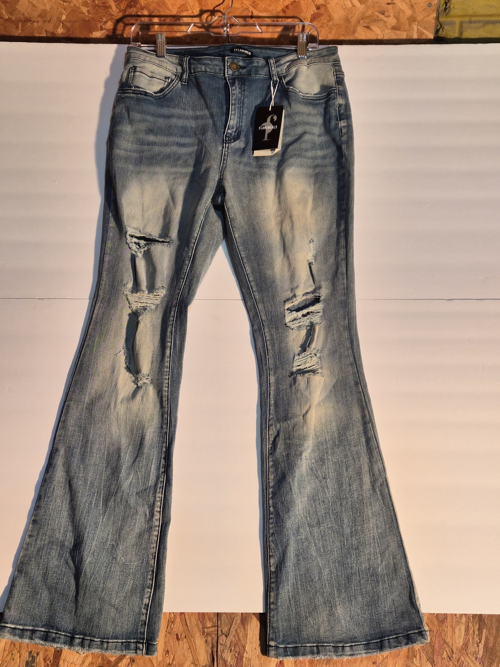 Distressed Light Blue Flare Jeans - Flamingals